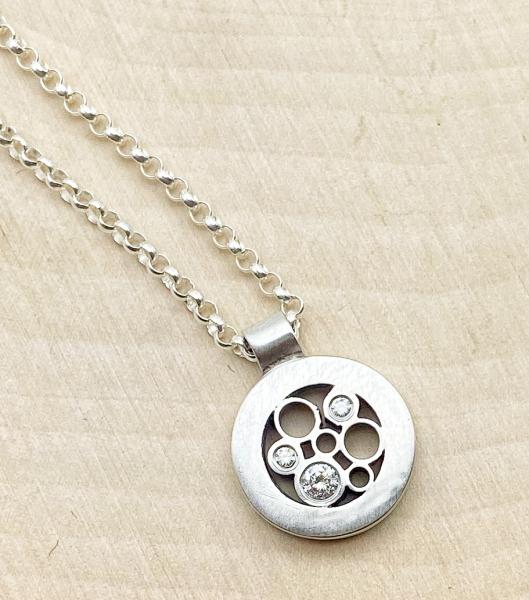 Sterling silver and diamond circle necklace. $380.00