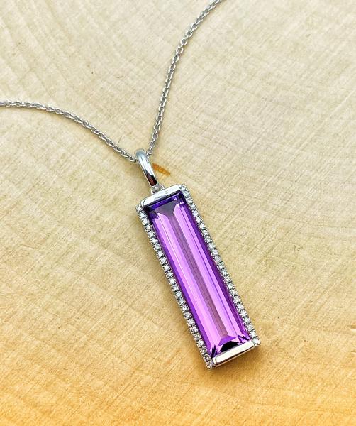 14 karat white gold custom baguette cut amethyst and diamond necklace. $1260.00