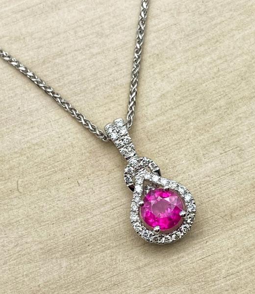 14 karat white gold ruby and diamond necklace. $2850.00