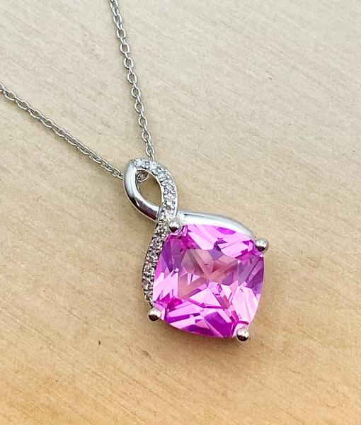 14 karat white gold lab grown cushion cut pink sapphire and diamond necklace. $770.00 