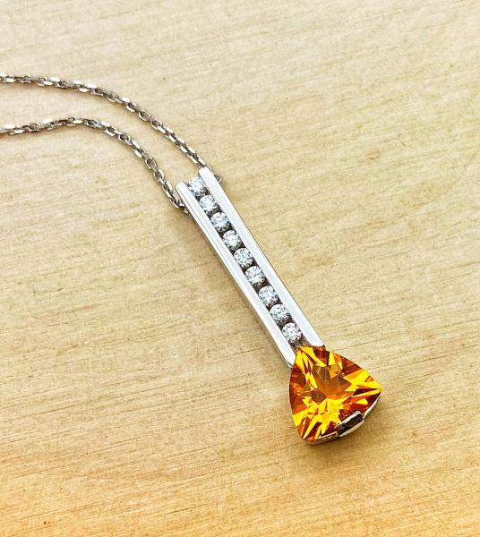 18 karat white gold trillion cut citrine and diamond necklace. $1050.00