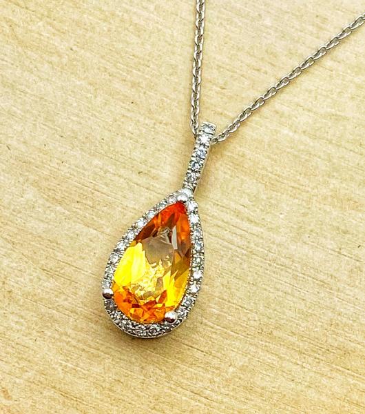 14 karat white gold pear shape citrine and diamond necklace. $750.00