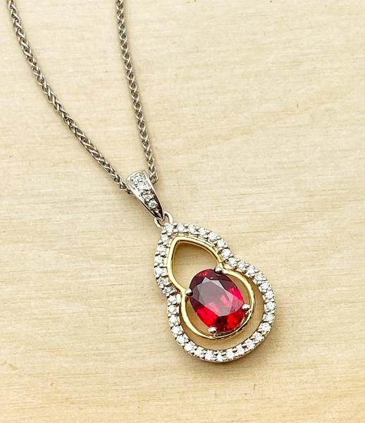 18 karat white and yellow gold Madagascar ruby and diamond necklace. $3,755.00