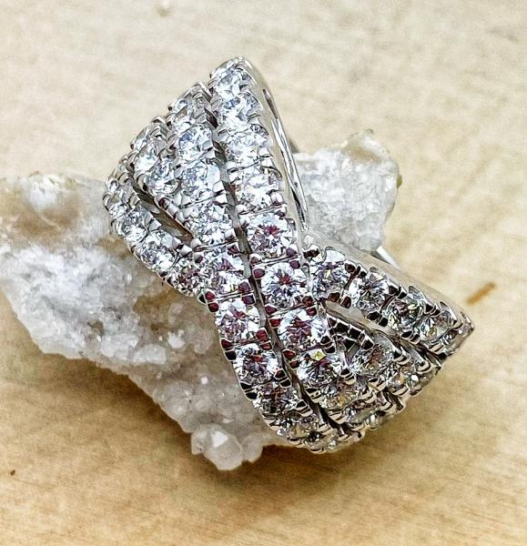 14 karat white gold ribbon design lab diamond ring totaling 2.00 carats. $3300.00