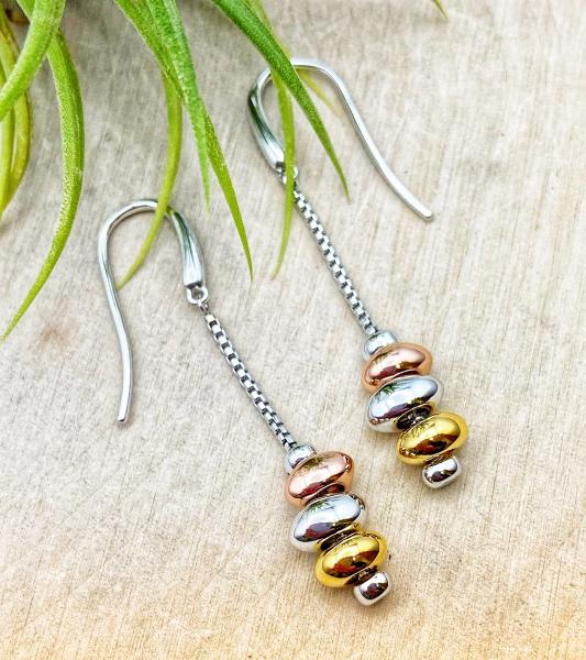 Sterling silver tri-color pebble dangle earrings. $185.00