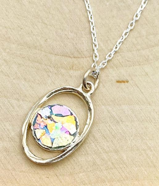 Sterling silver oval framed Roman glass necklace. $115.00