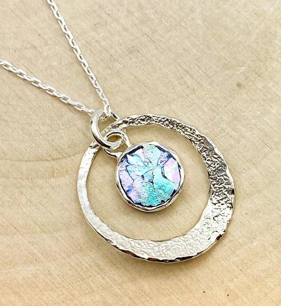 Sterling silver hammered frame Roman glass necklace. $135.00