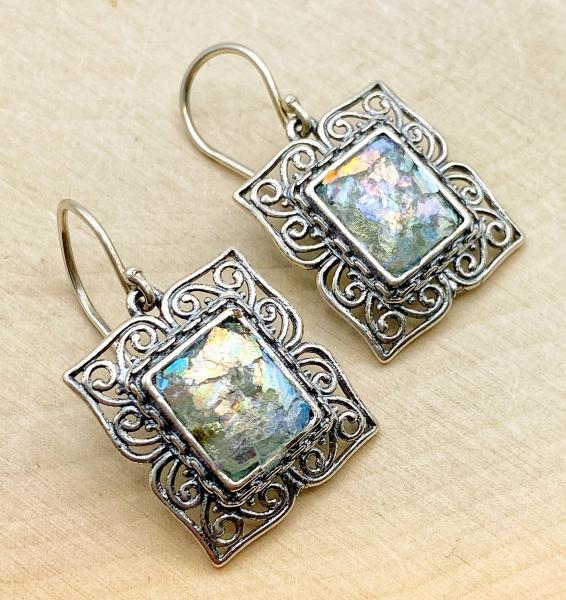 Sterling silver rectangular scroll framed Roman glass earrings. $315.00