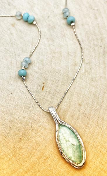 Sterling silver oval green Roman glass with aqua and moonstone rondels. $250.00