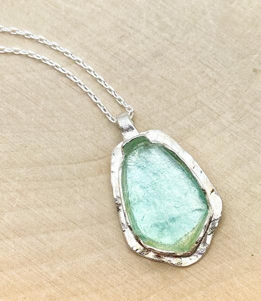 Sterling silver green Roman glass necklace. $150.00