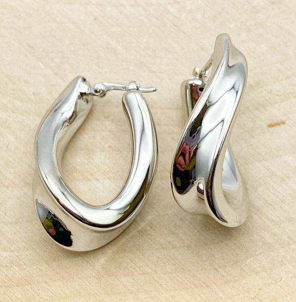 Sterling silver tapered twist hoop earrings. $107.00
