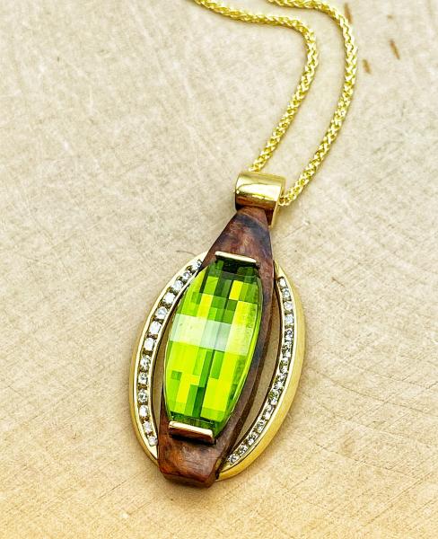 18 karat yellow gold custom barrel cut peridot, carved wood and diamond necklace. $4950.00***SOLD***