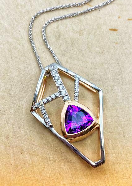 18 karat rose and white gold trillion amethyst and diamond necklace. $2450.00