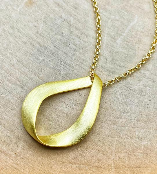 Sterling silver and 18 karat yellow gold vermeil necklace. $125.00
