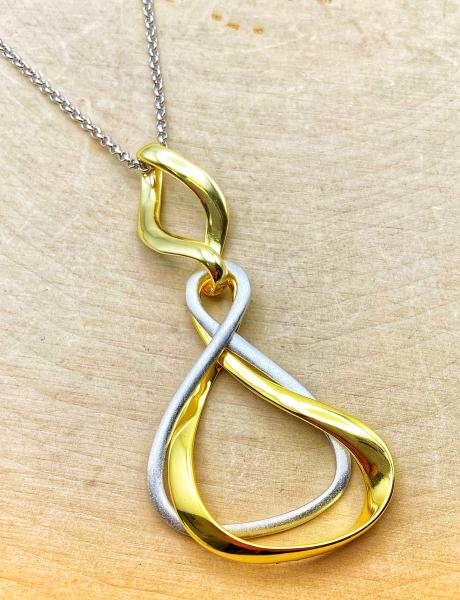 Sterling silver and 18 karat yellow gold vermeil double swirl "Venice" necklace. $355.00