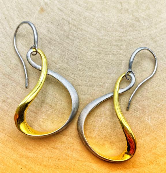 Sterling silver and 18 karat yellow gold vermeil "Venice" earrings. $282.00