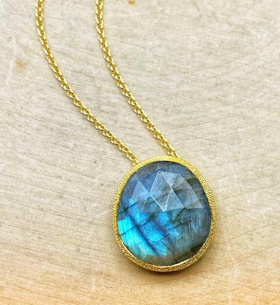 Sterling silver and 18 karat yellow gold vermeil faceted labradorite necklace. $236.00