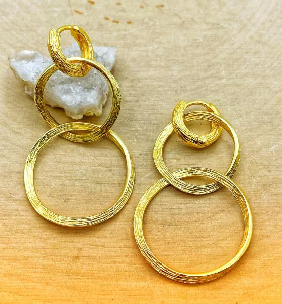 Sterling silver and 18 karat yellow gold vermeil dangle circle "Florence" earrings. $291.00