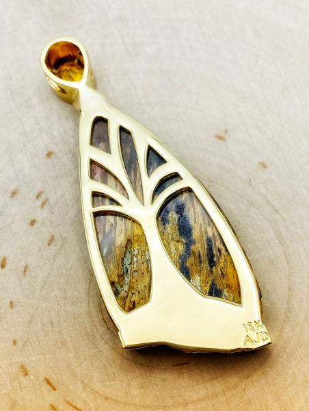 Reverse side of the Indonesian petrified wood pendant.