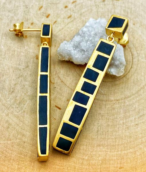 Sterling silver and 14 karat yellow gold vermeil "serenity" black resin earrings. $405.00