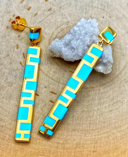 Sterling silver and 14 karat yellow gold blue ceramic inlay earrings. $465.00