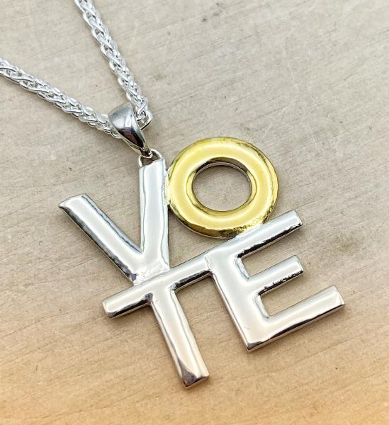 Sterling silver and 18 karat yellow gold vermeil VOTE necklace. $195.00