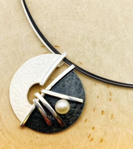 Sterling silver and freshwater cultured pearl textured finish necklace. $240.00