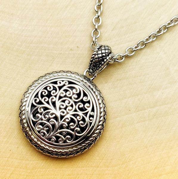 Sterling silver round filigree necklace. $325.00