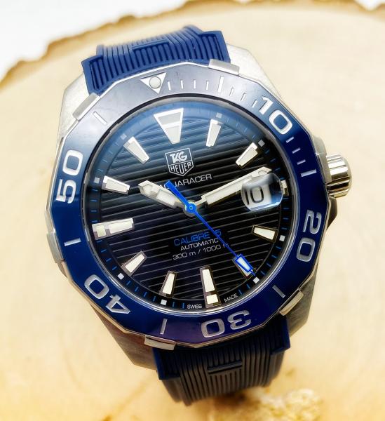 Gents stainless steel and blue ceramic Tag Heuer Aquaracer. $1995.00