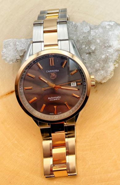Gents  18 karat rose gold and stainless steel Tag Heuer Carrera. $2850.00