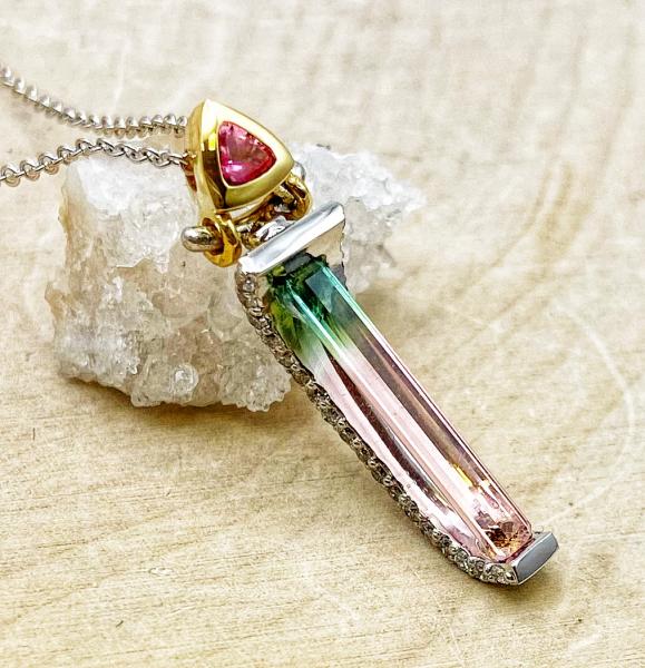 18 karat white and yellow gold baguette cut watermelon tourmaline, diamond and pink tourmaline necklace. $1650.00