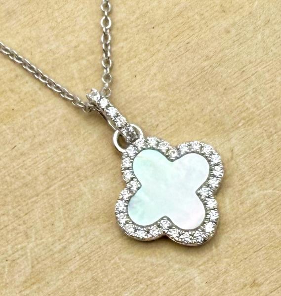 14 karat white gold mother of pearl and diamond necklace. $1535.00