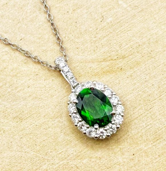 14 karat white gold Chrome Diopside and diamond necklace. $2890.00