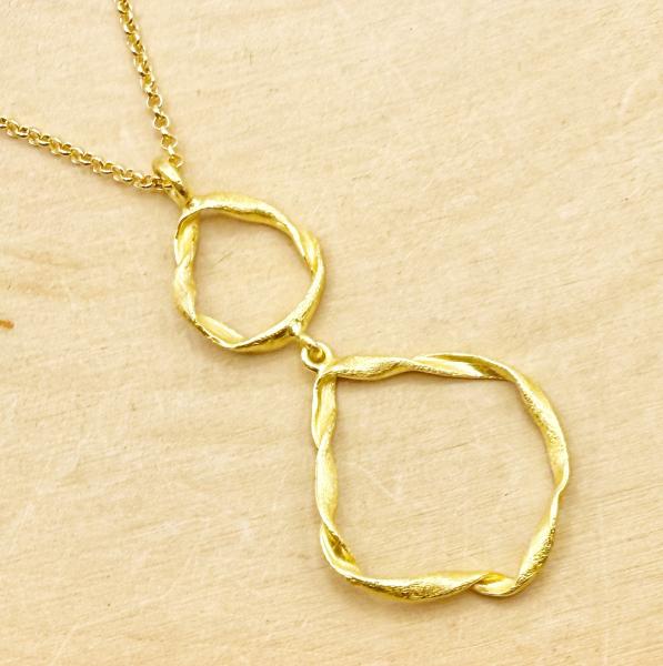 Sterling silver and 18 karat gold vermeil twist design necklace. $150.00