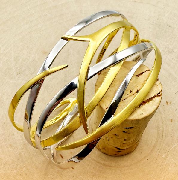Sterling silver and 18 karat vermeil wide cuff bracelet. $870.00