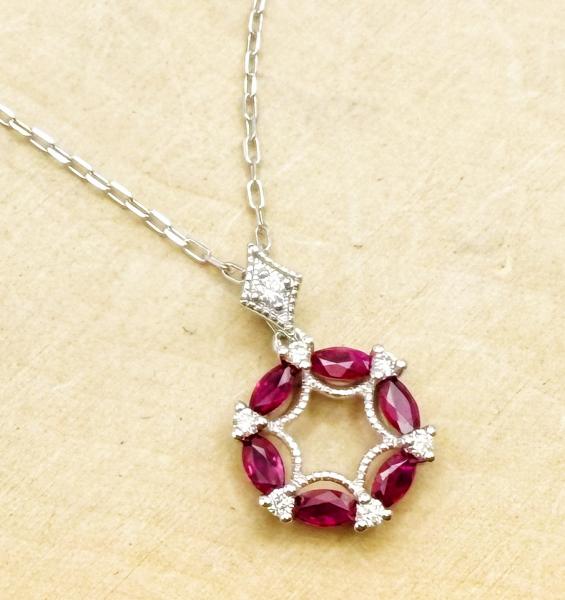 14 karat white gold marquise ruby and diamond necklace. $1845.00