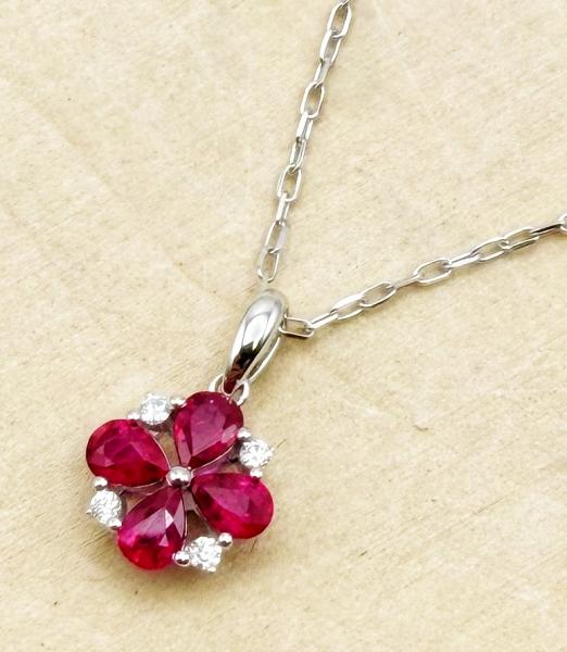 14 karat white gold pear shape ruby and diamond necklace. $1580.00