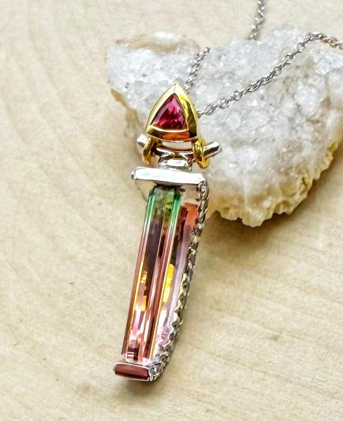 18 karat white and yellow gold baguette cut watermelon tourmaline, diamond and pink tourmaline necklace. $2400.00