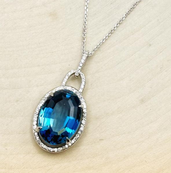 14 karat white gold 8.23 carat oval London blue topaz and diamond necklace. $2,470.00