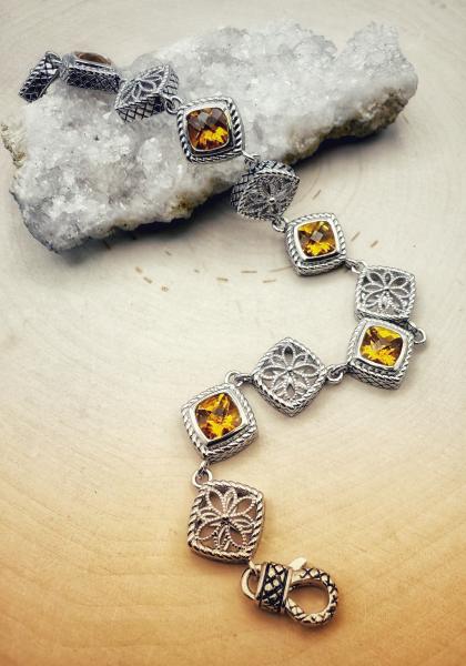 Sterling silver cushion checkerboard cut citrine bracelet. $650.00