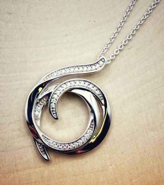 Sterling silver and cubic zirconia helix wrap necklace. $135.00