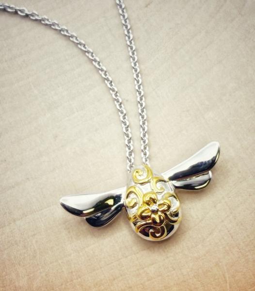 Sterling silver and 18 karat yellow gold vermeil honey bee necklace. $170.00