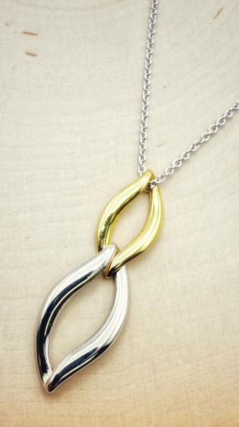 Sterling silver and 18 karat gold vermeil double marquise necklace. $170.00