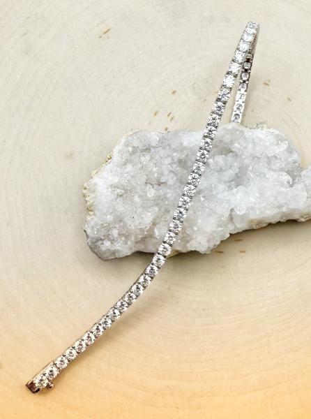 14 karat white gold 6 carat total weight lab grown diamond tennis bracelet. $5,200.00