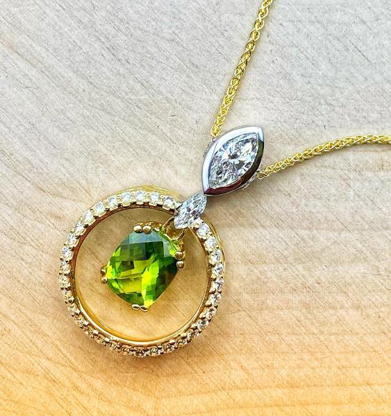 18 karat yellow and white gold 2.71 carat cushion cut peridot and diamond necklace. 550-13733