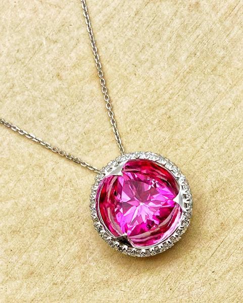 18 karat white gold 3.50 carat trillion cut pink topaz "reflections" pendant. 550-13685