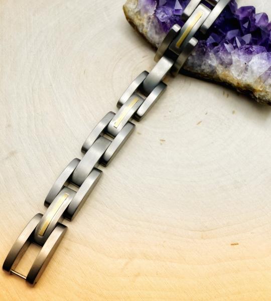 Titanium and 14 karat yellow gold inlay bracelet. $390.00