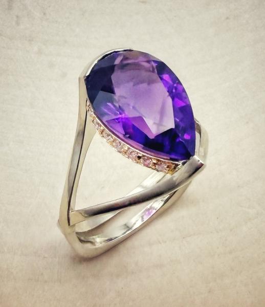 18 karat white and rose gold 4.15 carat pear shape amethyst and diamond ring. $2,850.00