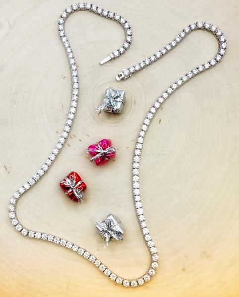 The Diamond Tennis Necklace. 135 brilliant cut lab grown diamonds totaling 13.61 carats. 18" in length. $9,500.00