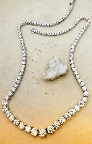 14 karat white gold 16" graduated Riviera necklace with lab grown diamonds totaling 20.00 carats. $15,000.00